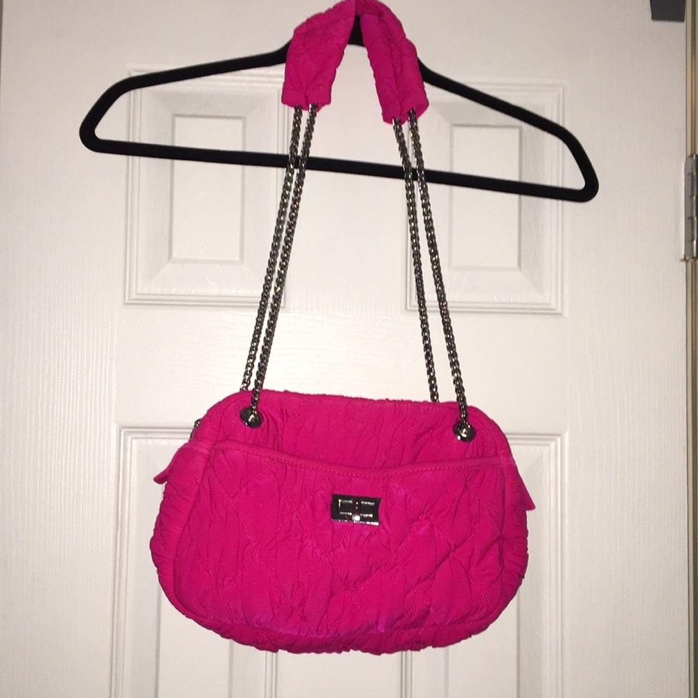 Hot pink purse with metal accents